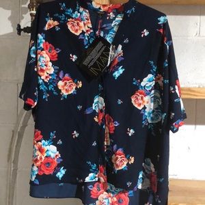 New with tag Oman size small fits larger